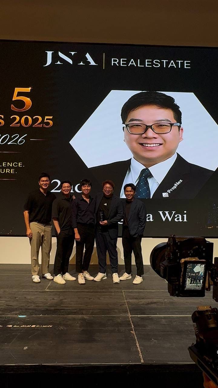 Ka Wai and team on stage receiving the 2nd Top Producer award at the JNA Real Estate Top 5 Awards 2025